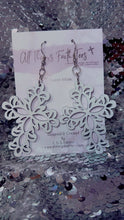 Load image into Gallery viewer, White floral design boho cross earrings hanging on All Things Faith Tees branded card