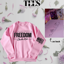 Load image into Gallery viewer, Pink freedom glitter sweatshirt from All Things Faith TEES with Charlie Kirk design on front and sleeve