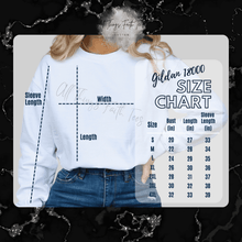 Load image into Gallery viewer, Freedom glitter sweatshirt white long sleeve T-shirt displayed with size chart from All Things Faith TEES

