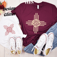 Load image into Gallery viewer, New Mexico Zia glitter t-shirt in burgundy and white with rose design and paired with white sneakers and blue jeans
